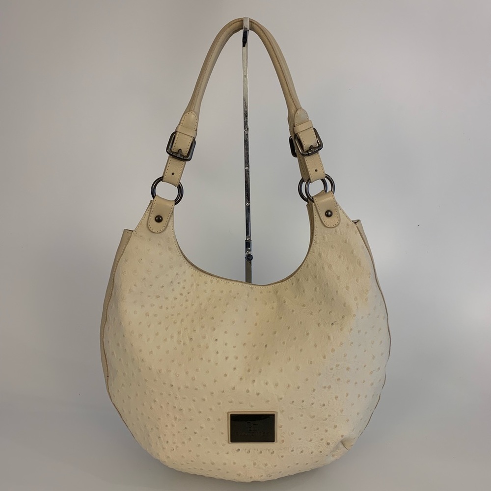 Puntotres Leather Handbag